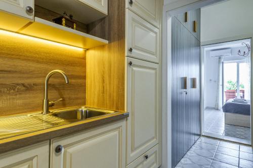 Kuchyňa alebo kuchynka v ubytovaní Apartments Rija