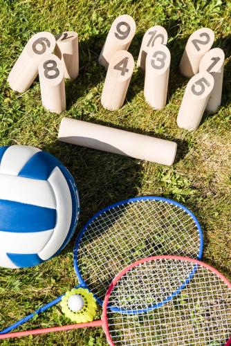 a group of tennis equipment on the grass at Ibis Château-Thierry in Essômes-sur-Marne