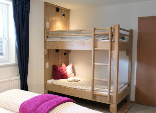 Voodi või voodid majutusasutuse Apart Riffla toas