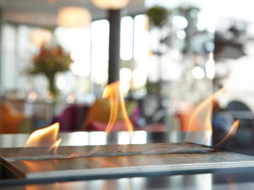 a close up of a wooden table with chairs at Hotel-Restaurant-Schifflände in Birrwil