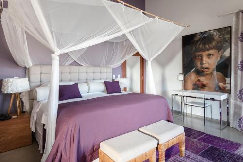 Katil atau katil-katil dalam bilik di Campo Bahia Hotel Villas Spa