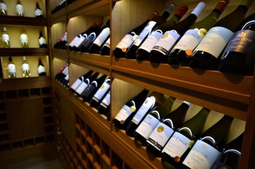 a room filled with lots of bottles of wine at Radisson Hotel Curico in Curicó