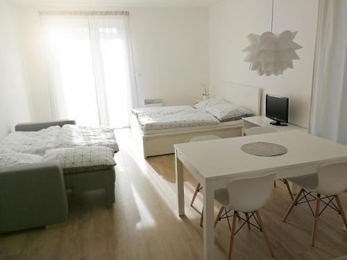 Кровать или кровати в номере Apartmán SUN Dolní Morava