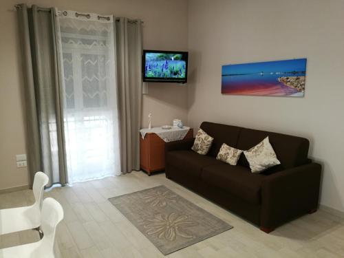 TV a/nebo společenská místnost v ubytování La Maison