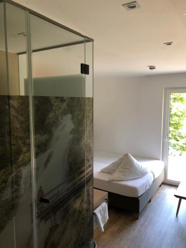 Postel nebo postele na pokoji v ubytování Lifesport Hotel Hechenmoos