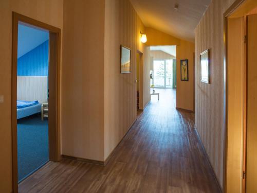 an empty hallway with a door to a room at An der Pappelwende in Ostseebad Karlshagen
