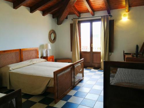 Postel nebo postele na pokoji v ubytování Hotel Il Vecchio Mulino