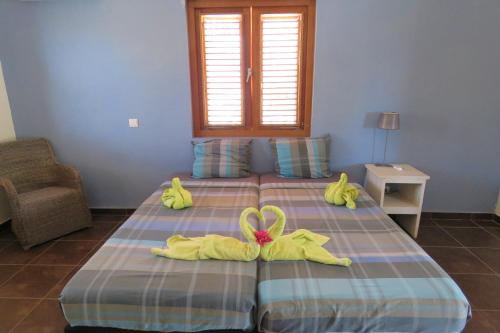 Кровать или кровати в номере Apartemento Gosa Bunita