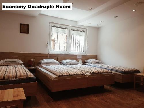 Postel nebo postele na pokoji v ubytování Guest House Edem II