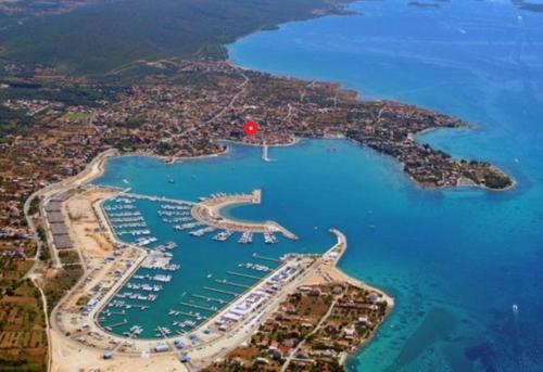 an aerial view of a harbor with a marina at Apartmani Svitlana in Sukošan