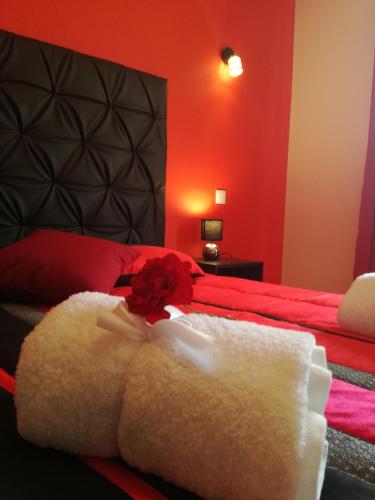 Ένα ή περισσότερα κρεβάτια σε δωμάτιο στο Sensations Guesthouse