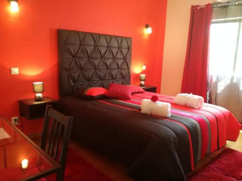 Ένα ή περισσότερα κρεβάτια σε δωμάτιο στο Sensations Guesthouse
