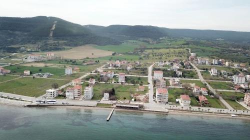 an aerial view of a city next to the water at Boss 2 Hotel in Eceabat