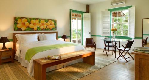 A bed or beds in a room at Lake Vilas Charm Hotel