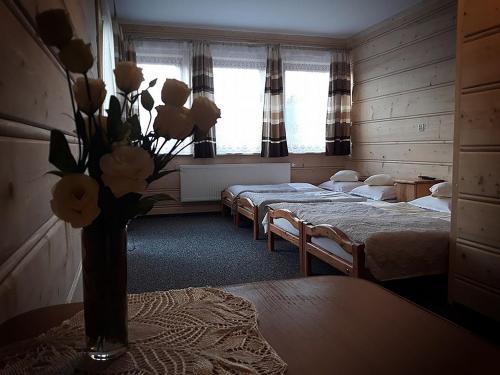 Posteľ alebo postele v izbe v ubytovaní Willa Perełka