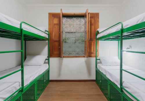 Krevet ili kreveti na kat u jedinici u objektu Br Hostel