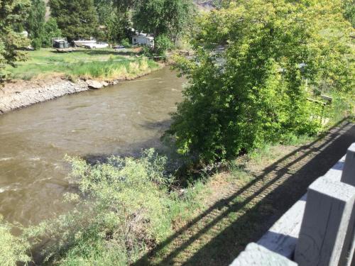 a view of a river from a bridge at Riverside Motel Cache Creek in Cache Creek