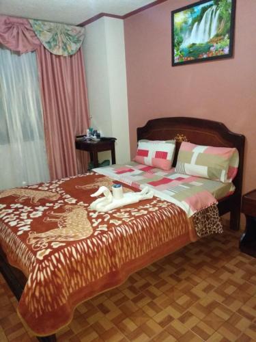 Cama o camas de una habitación en Nuevo Horizonte