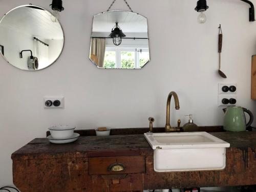 Ванная комната в Beautiful Bungalow CBD
