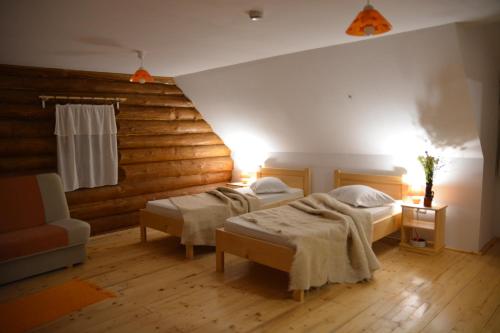 מיטה או מיטות בחדר ב-Valea Vistisoarei