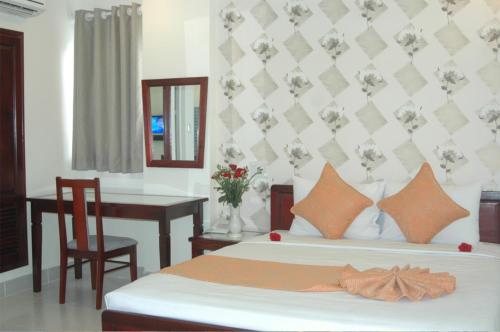 Cama o camas de una habitación en Ha Anh Hotel - Mui Ne