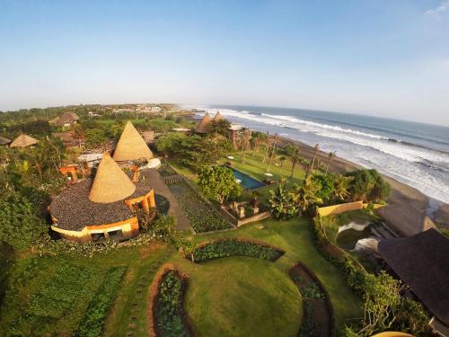 an aerial view of a resort near the ocean at WakaGangga in Tabanan