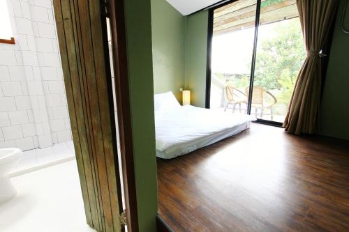 Postel nebo postele na pokoji v ubytování Here Hostel Bangkok