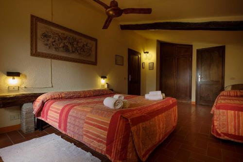 Cama o camas de una habitación en Agriturismo Bio Le Macchie Alte