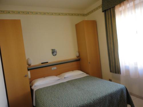 Katil atau katil-katil dalam bilik di Hotel Mariani
