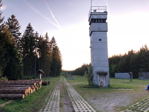 a light house next to some railroad tracks at Pension Raststüb'l in Sorge