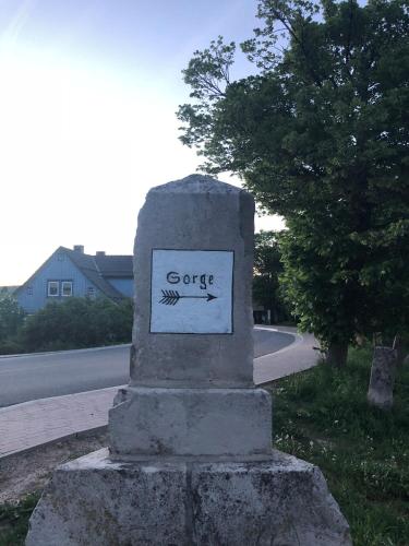 a stone monument with the word course written on it at Pension Raststüb'l in Sorge