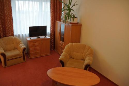 TV a/nebo společenská místnost v ubytování Hotel BOSiR