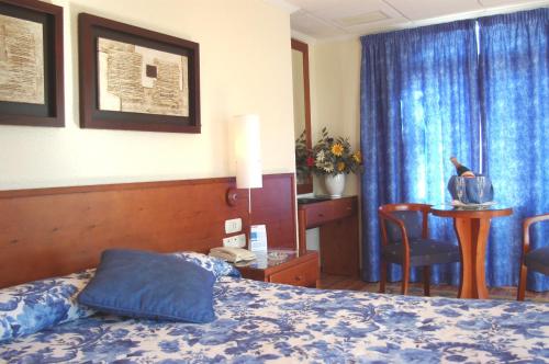 Letto o letti in una camera di Hotel Masa International