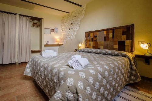 Cama o camas de una habitación en Agriturismo Bio Le Macchie Alte