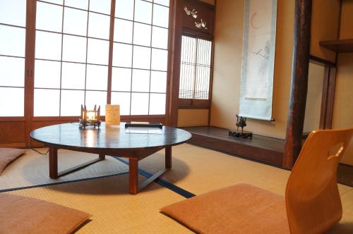 Un lugar para sentarse en Guesthouse Itoya Kyoto