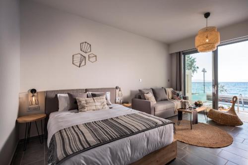 Postel nebo postele na pokoji v ubytování Villa Di Mare Seaside Suites