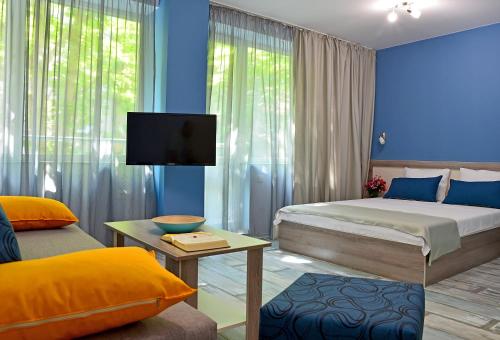 Postel nebo postele na pokoji v ubytování Visito Aparthouse