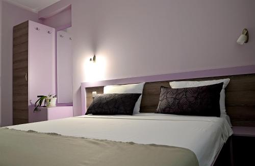 Katil atau katil-katil dalam bilik di Visito Aparthouse