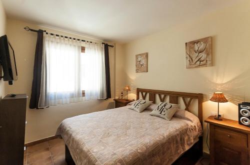 Postel nebo postele na pokoji v ubytování Lets Holidays apartment Tarull