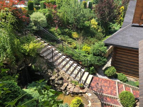 an overhead view of a garden with a wooden staircase at Slanický Dvor in Námestovo