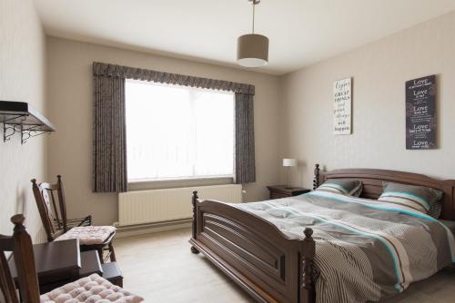 Katil atau katil-katil dalam bilik di Lovely Guesthouse Lier