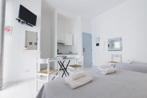 Katil atau katil-katil dalam bilik di Lo Nardo Accommodation