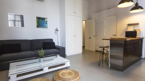 Ruang duduk di Apartamentos Málaga Picasso