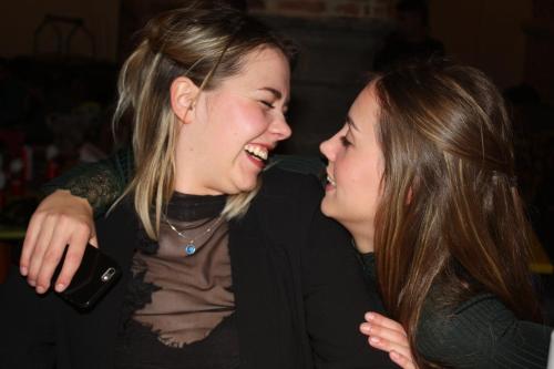 two women standing next to each other and laughing at Antwerp City Hostel in Antwerp