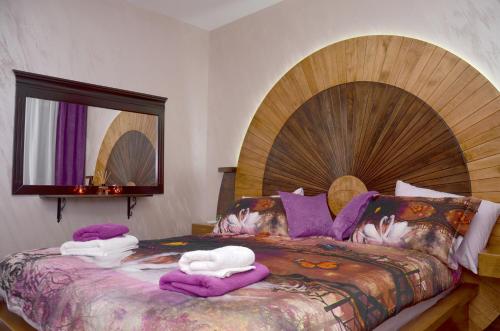 Ein Bett oder Betten in einem Zimmer der Unterkunft Kruna apartmani
