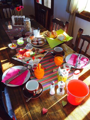 a wooden table with food on top of it at Agroturismo S Hort de Can Carrio AG226 in Ses Salines