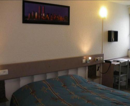 Krevet ili kreveti u jedinici u objektu Contact Hôtel Come Inn