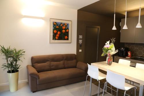 a living room with a couch and a table at Casa Ercoli B&B in Vinci