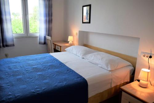 Posteľ alebo postele v izbe v ubytovaní Sunnyy Beacch Apartments