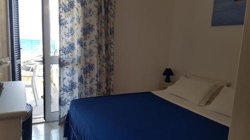 Postel nebo postele na pokoji v ubytování Pietra di Luna a...mare